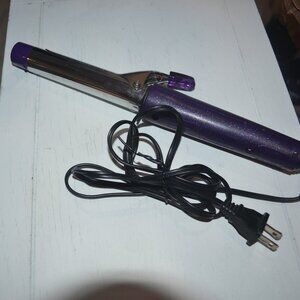Pre-owned 1 inch Conair curling iron with purple handle and silver color barrel.